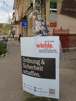 Plakat vor linker Buchhandlung u. Spechtpassage der Wiehle-Kampagne