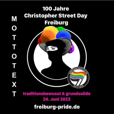  CSD Freiburg 2023 - Demo 100 Jahre CSD Freiburg - traditionsbewusst &amp; grundsolide freiburg-pride - Person mit Bollenhut und Antifa Logo