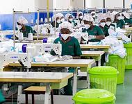 https://upload.wikimedia.org/wikipedia/commons/6/6c/Uganda_textile_workers.jpg