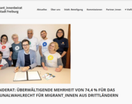 Vertreter*innen des Migrant*innenbeirats mit OB Horn, der die Städteerklärung unterzeichnet (Screenshot)