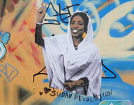 Wandcollage mit der Aktivistin Alaa Salah aus dem Sudan