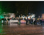 Demonstration mit Banner "Rojava verteidigen"