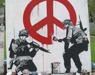 banksy-soldiers-painting-peace-sign